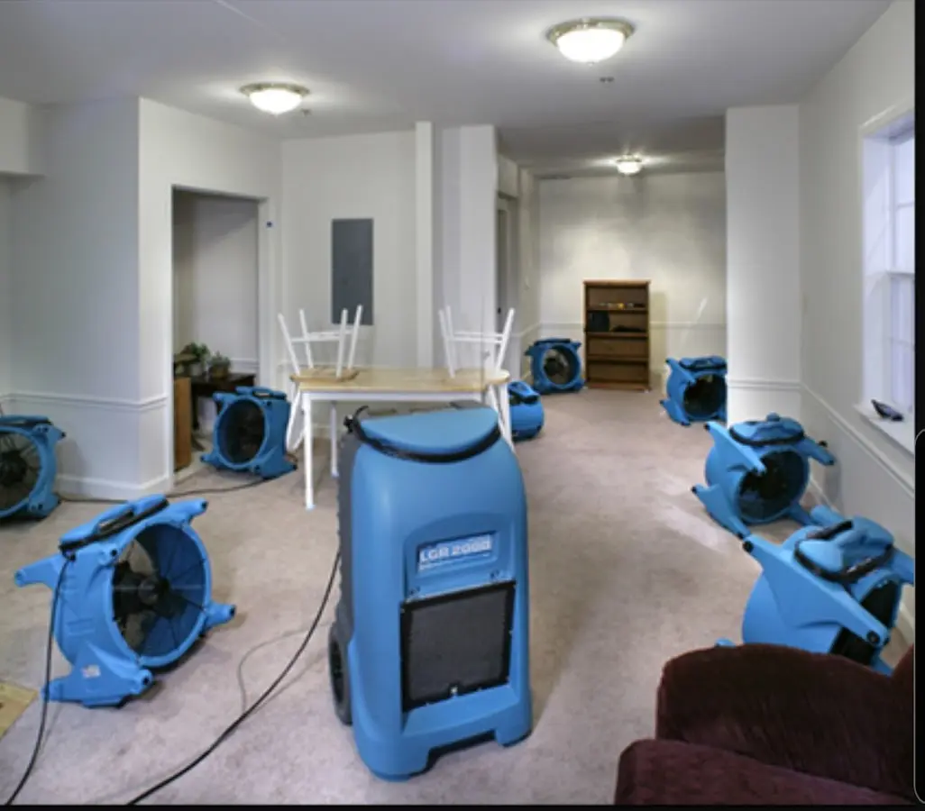 Air movers and dehumidifier setup for Water Damage Restoration in Huber Heights